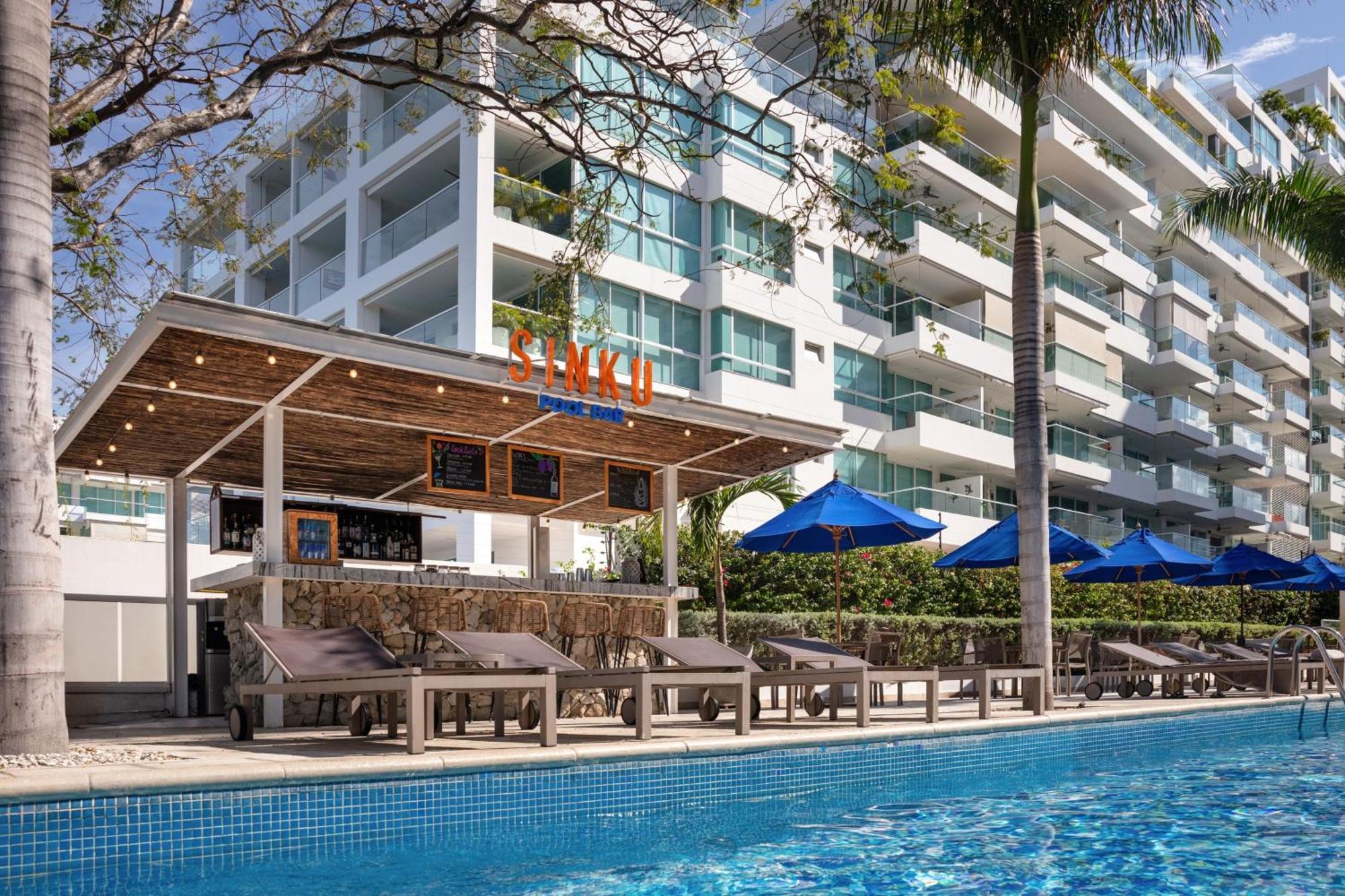 Santa Marta Marriott Resort Playa Dormida Exterior foto The swimming pool at the hotel
